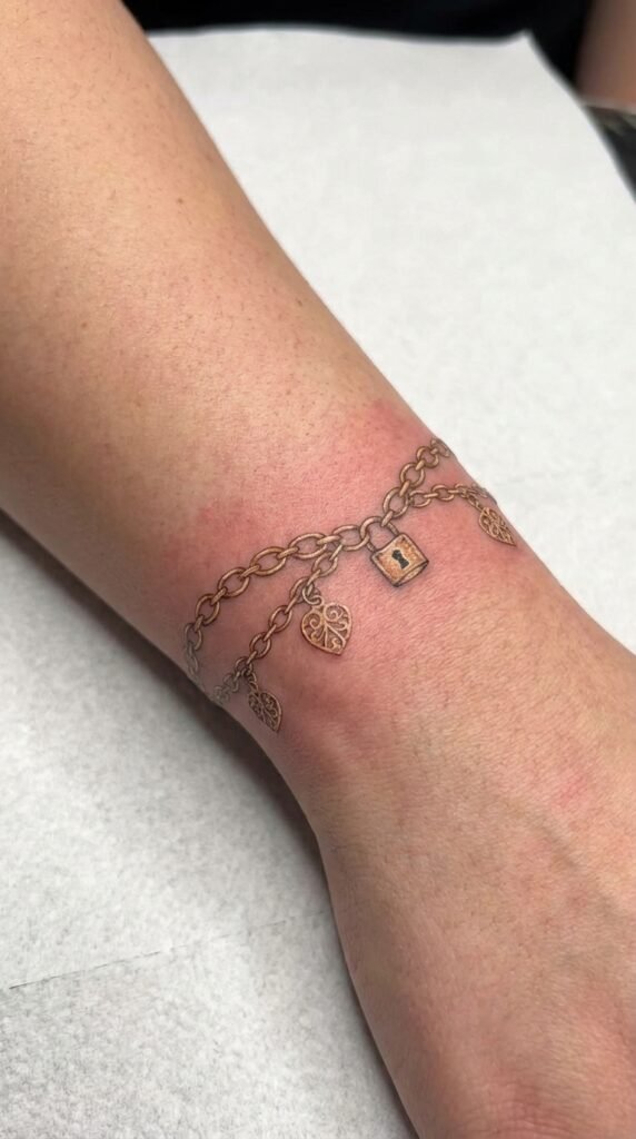 35 Elegant Tattoo Ideas for Women – Meaning & Best Placement Guide 35 Jewelry chain tattoo b707031639 1