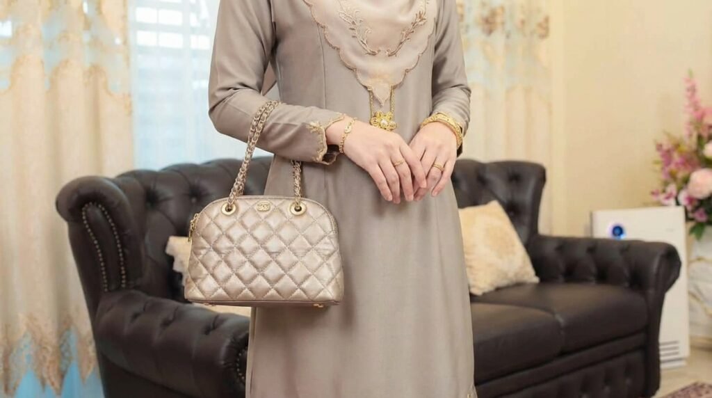 Hari Raya Modest Fashion 2026 in Malaysia: Elegant Embroidered Looks for Modern Muslim Women 9 Malaysian muslim woman wearing taupe embroidered m f63c3ceae7