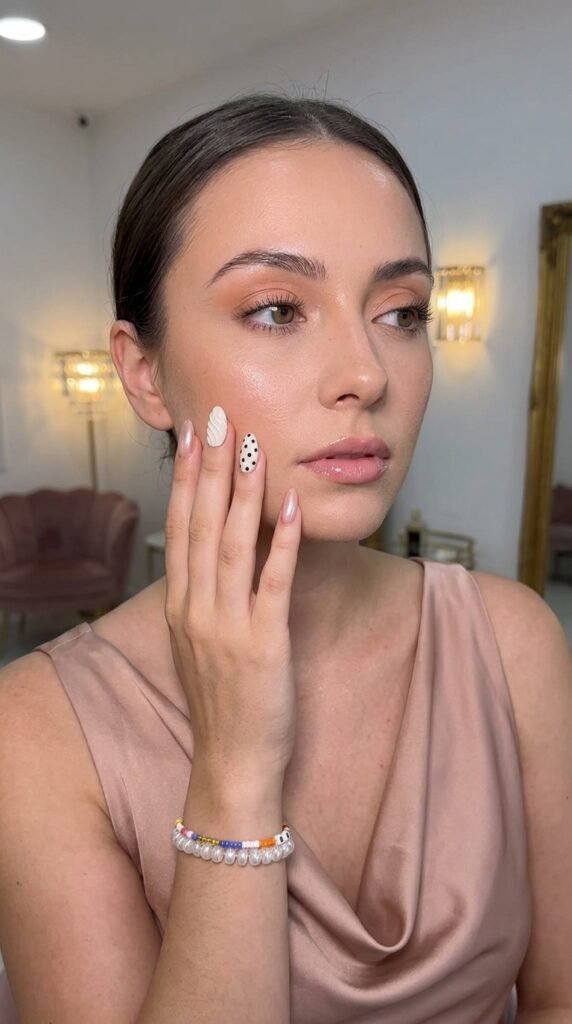 Woman touching face 202603262026