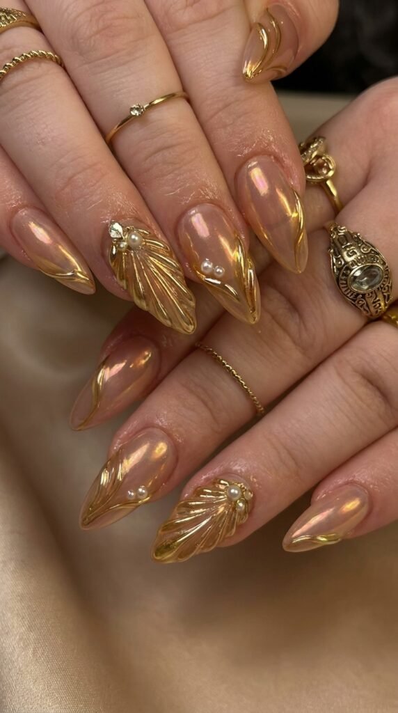Luxury Gold Nail Art Trends for Women in 2026 3 Feminine hands with gold nails 202605172224