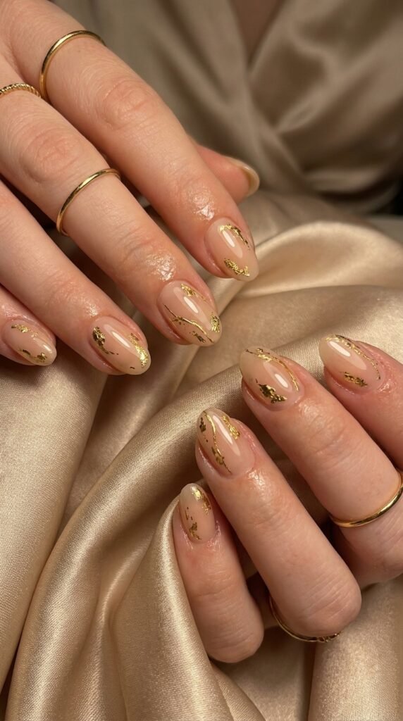 Luxury Gold Nail Art Trends for Women in 2026 7 Manicure with gold foil accents 202605172229
