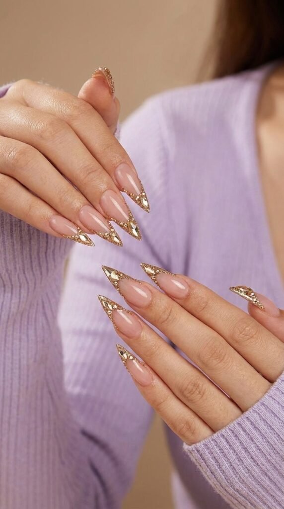 Luxury Nail Design Ideas: Rhinestones, Metallic Tips & Shapes 2 Model showing luxury nail designs 202605150244